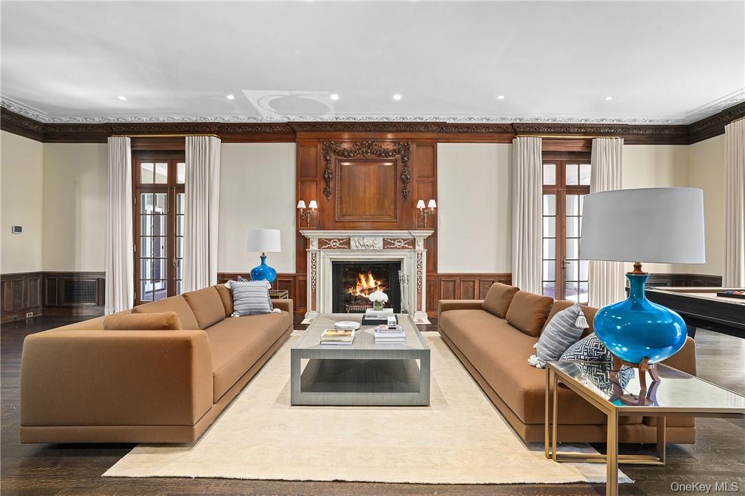 99 Mamaroneck Road Scarsdale, NY 10583 - Photo 11 of 35 Great Room with Soaring Ceilings and Wood Burning Fireplace