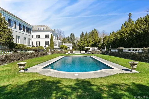 a view of outdoor space yard and swimming pool