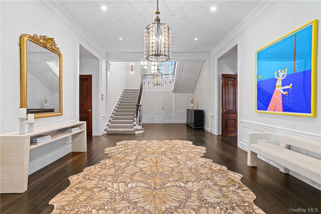 99 Mamaroneck Road Scarsdale, NY 10583 - Photo 3 of 35 Grand entry foyer introduces rich hardwood floors, high ceilings and an intelligently reimagined layout.