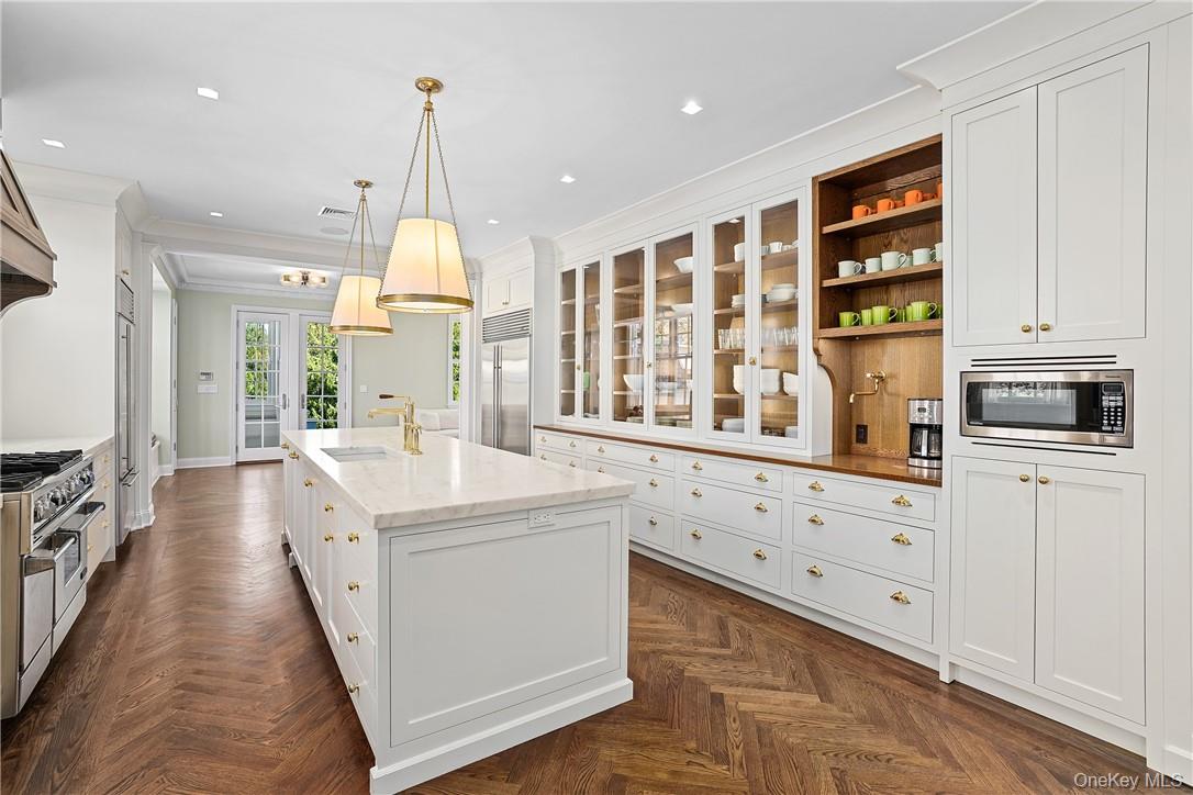 99 Mamaroneck Road Scarsdale, NY 10583 - Photo 6 of 35 This brand new kitchen dazzles with rows of fully custom inset cabinetry, upscale appliances