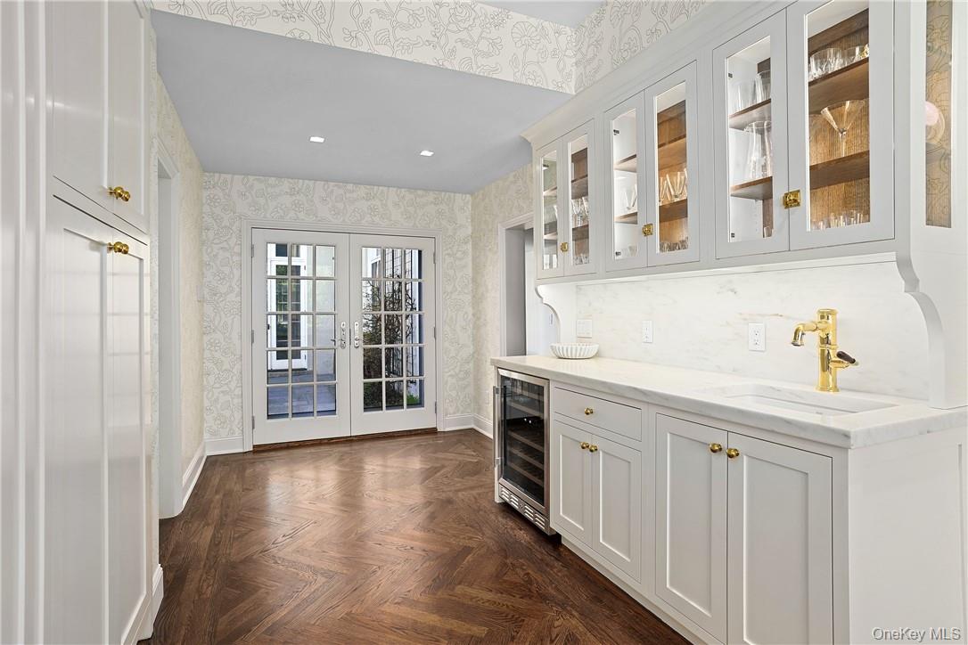 99 Mamaroneck Road Scarsdale, NY 10583 - Photo 8 of 35 Butler's Pantry with access to side patio