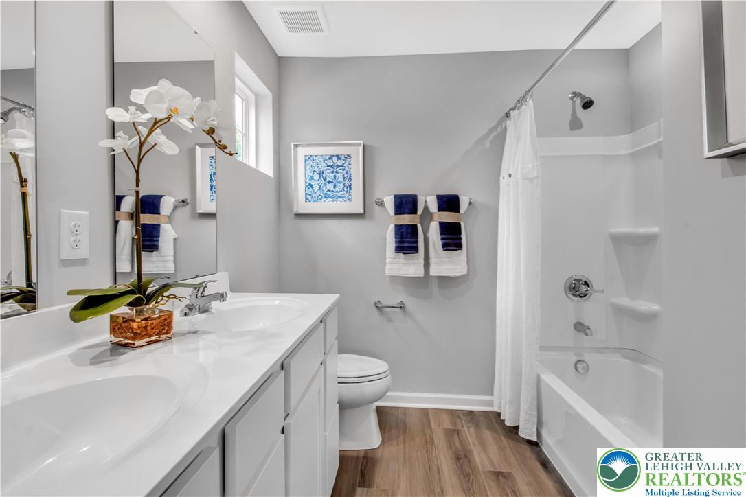 1 Shiloh Road, Unit P Orwigsburg, PA 17961 - Photo 12 of 15 a bathroom with a sink a toilet and a bathtub