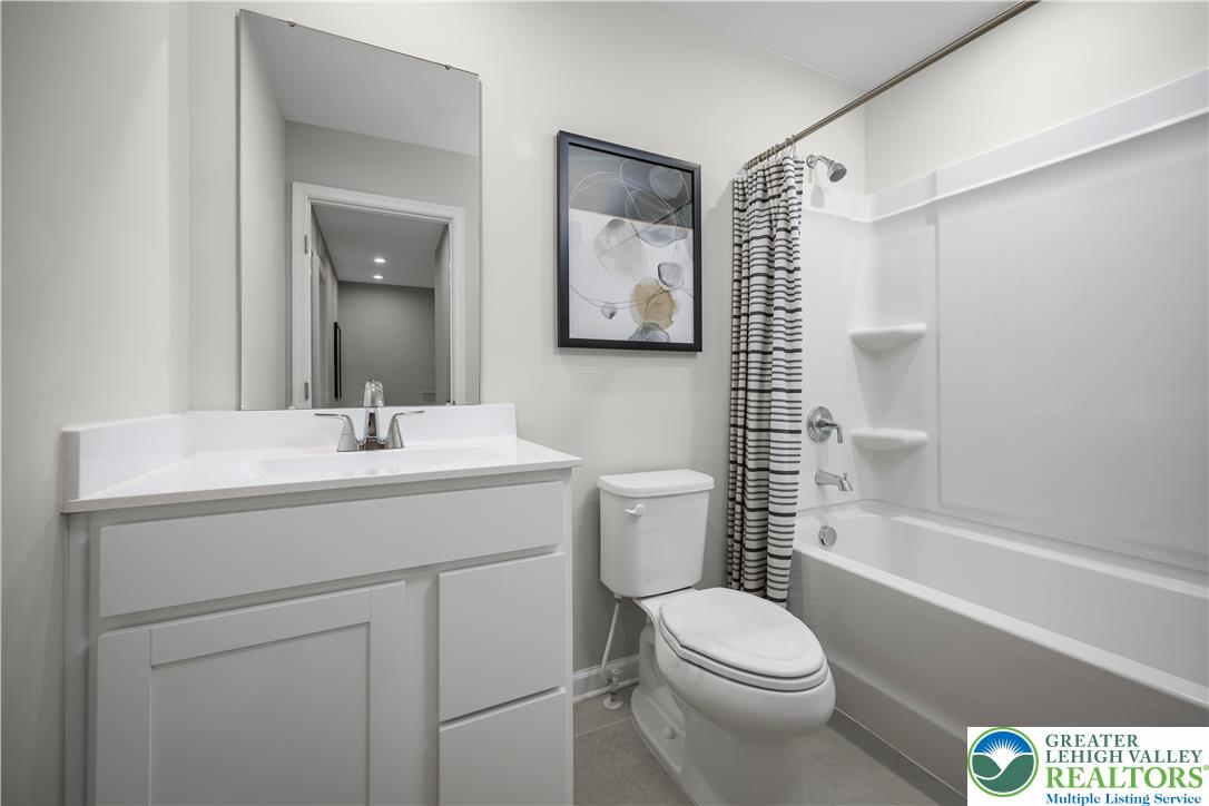 1 Shiloh Road, Unit P Orwigsburg, PA 17961 - Photo 14 of 15 a bathroom with a sink toilet and shower