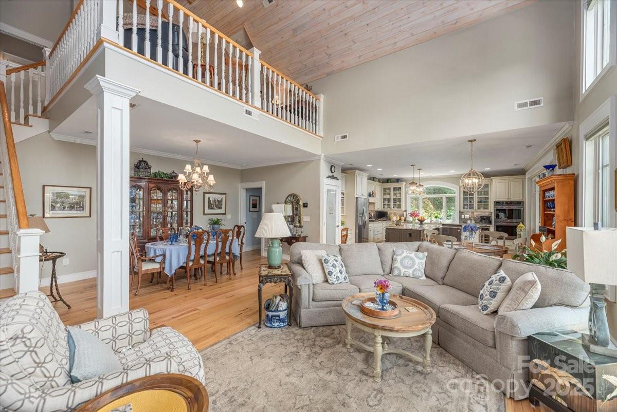 316 Fincher Mountain Road Waynesville, NC 28785 - Photo 12 of 46 a living room with furniture and a large window