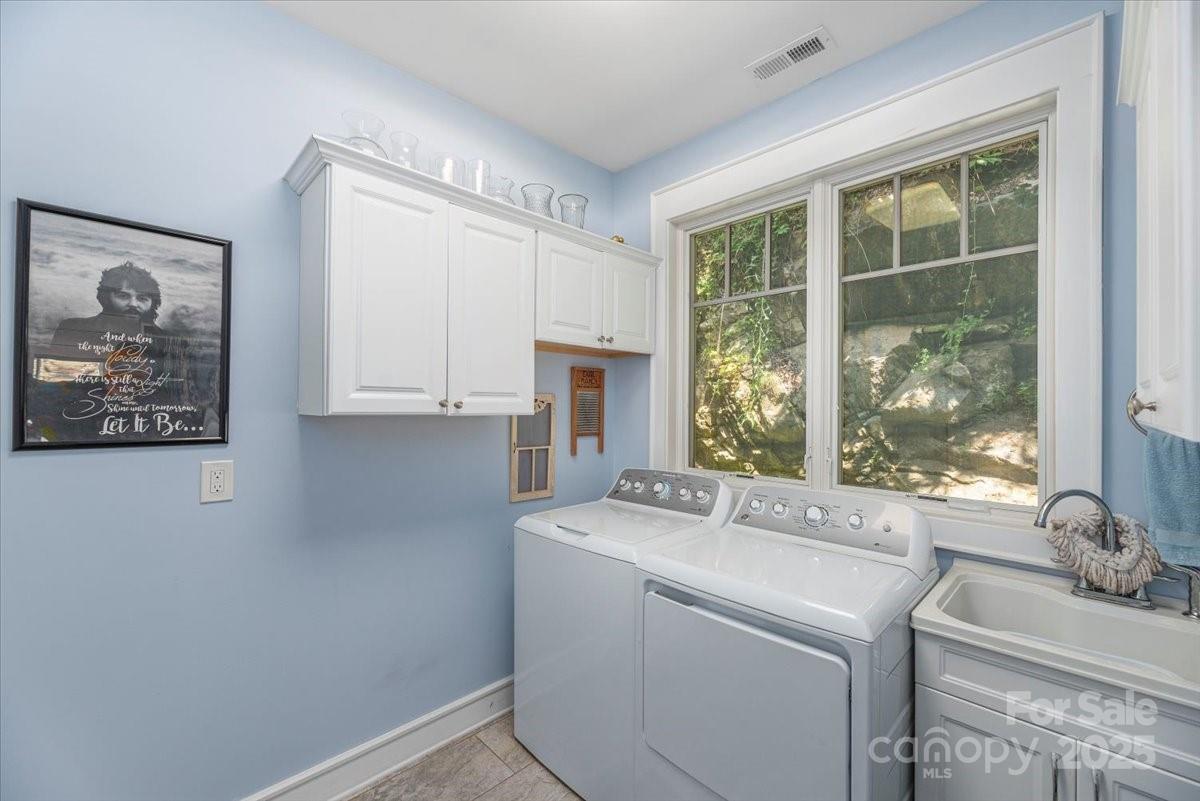 316 Fincher Mountain Road Waynesville, NC 28785 - Photo 34 of 46 a room with storage and utility