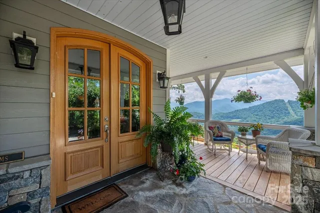a view of balcony with furniture