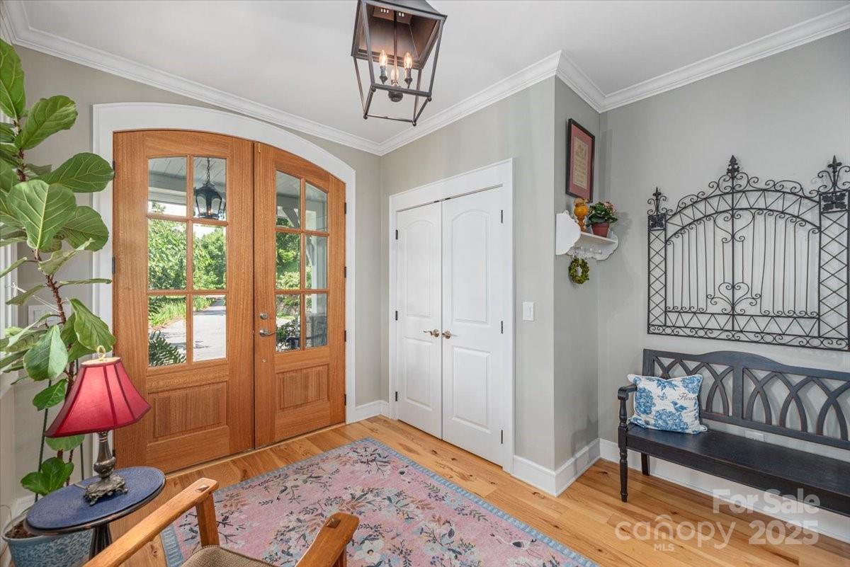 316 Fincher Mountain Road Waynesville, NC 28785 - Photo 6 of 46 a bedroom with furniture and a window