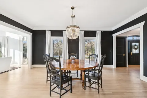 a kitchen with stainless steel appliances white cabinets and a sink