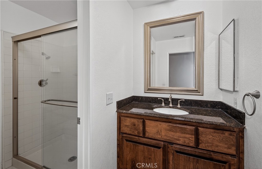 11984 Paradise Street Grand Terrace, CA 92313 - Photo 26 of 49 Downstairs Bathroom