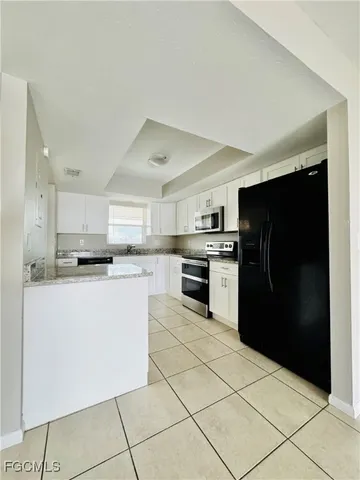 $1,400 | 706 Southeast 13th Court, Unit J, Cape Coral, FL 33990