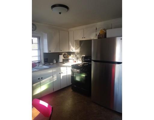 2223 Page Boulevard Springfield, MA 01151 - Photo 11 of 18 a kitchen with a refrigerator and a sink