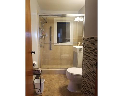 2223 Page Boulevard Springfield, MA 01151 - Photo 3 of 18 a bathroom with a toilet and a shower