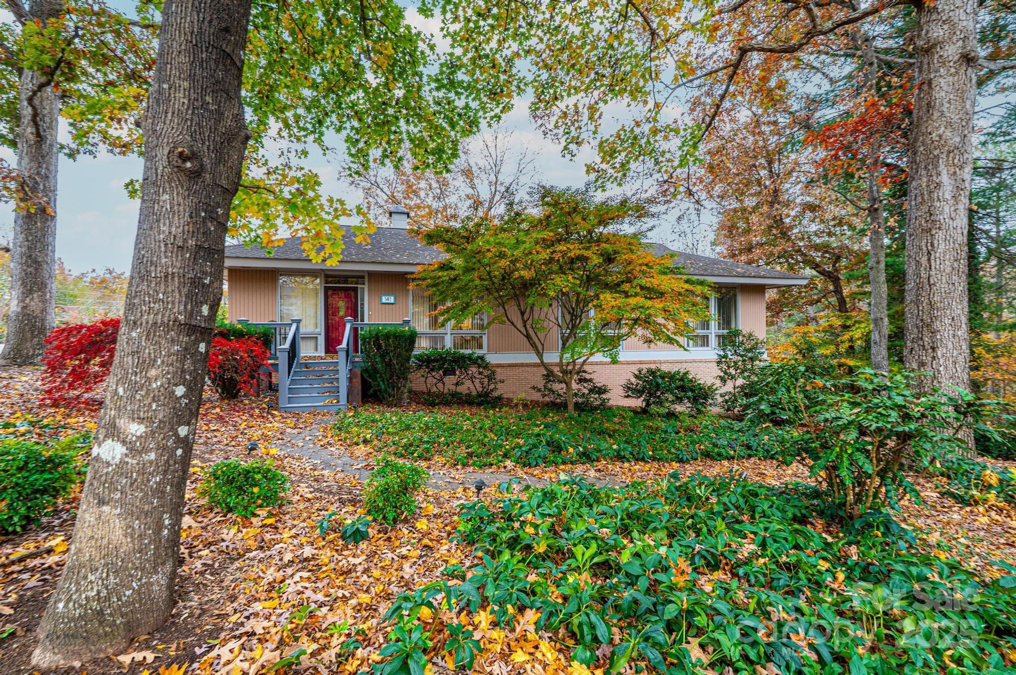 141 36th Avenue Northwest Hickory, NC 28601 - Photo 1 of 46 a view of house with a yard and garden