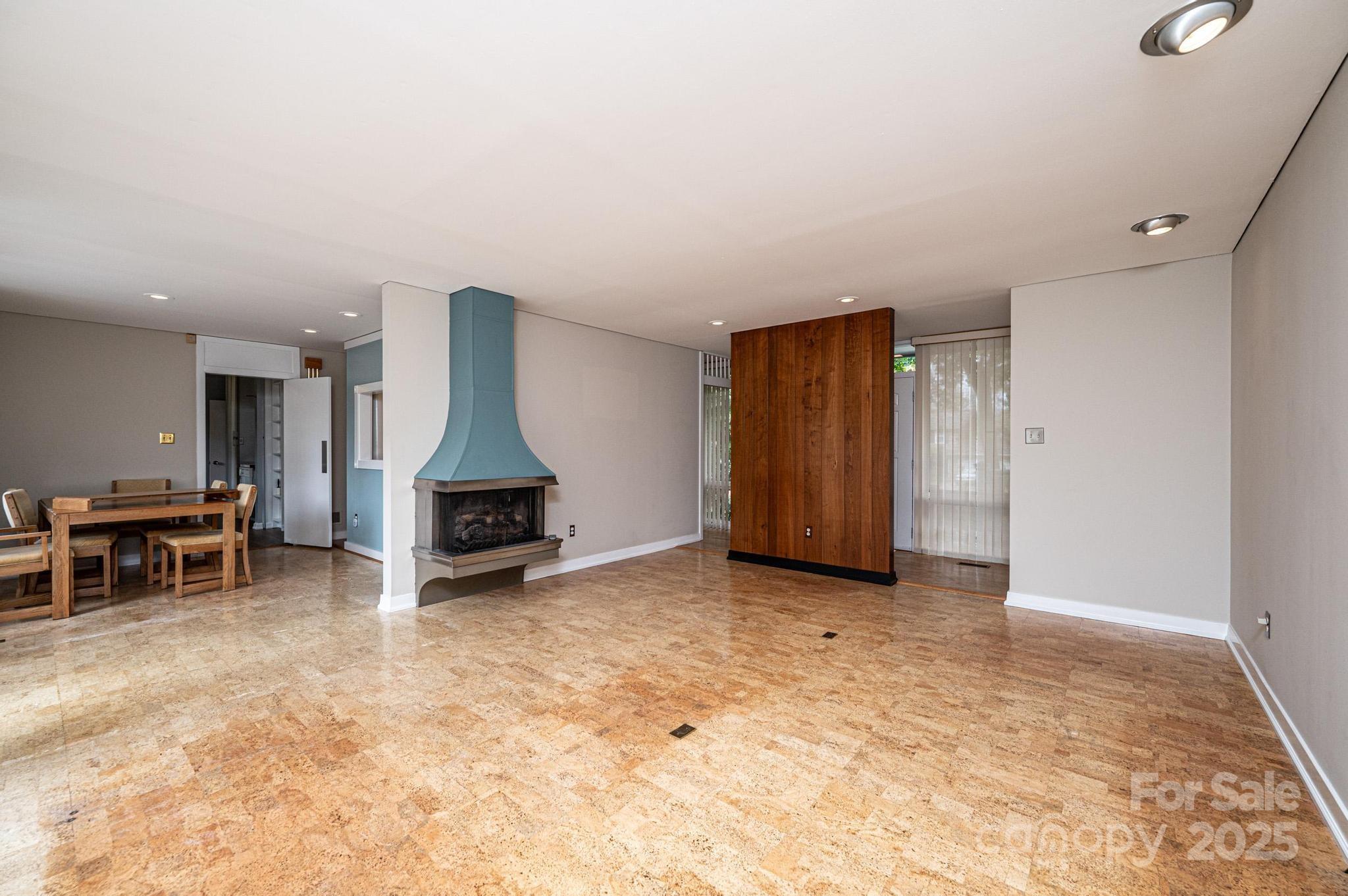 141 36th Avenue Northwest Hickory, NC 28601 - Photo 15 of 46 a view of a livingroom with furniture and a ceiling fan