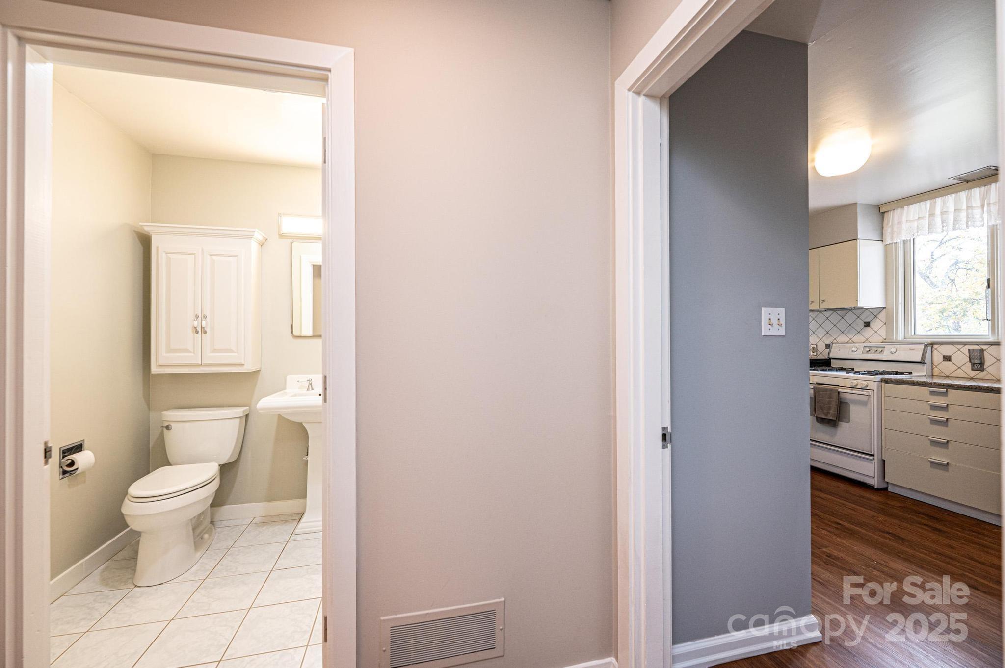 141 36th Avenue Northwest Hickory, NC 28601 - Photo 24 of 46 a bathroom with a granite countertop sink toilet and shower