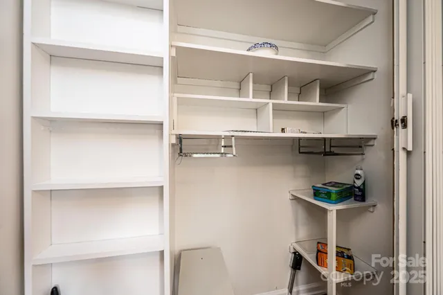 a room with storage and utility room