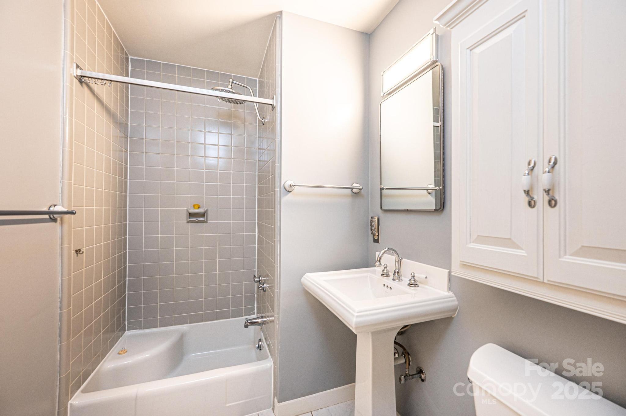 141 36th Avenue Northwest Hickory, NC 28601 - Photo 32 of 46 a bathroom with a sink toilet and shower
