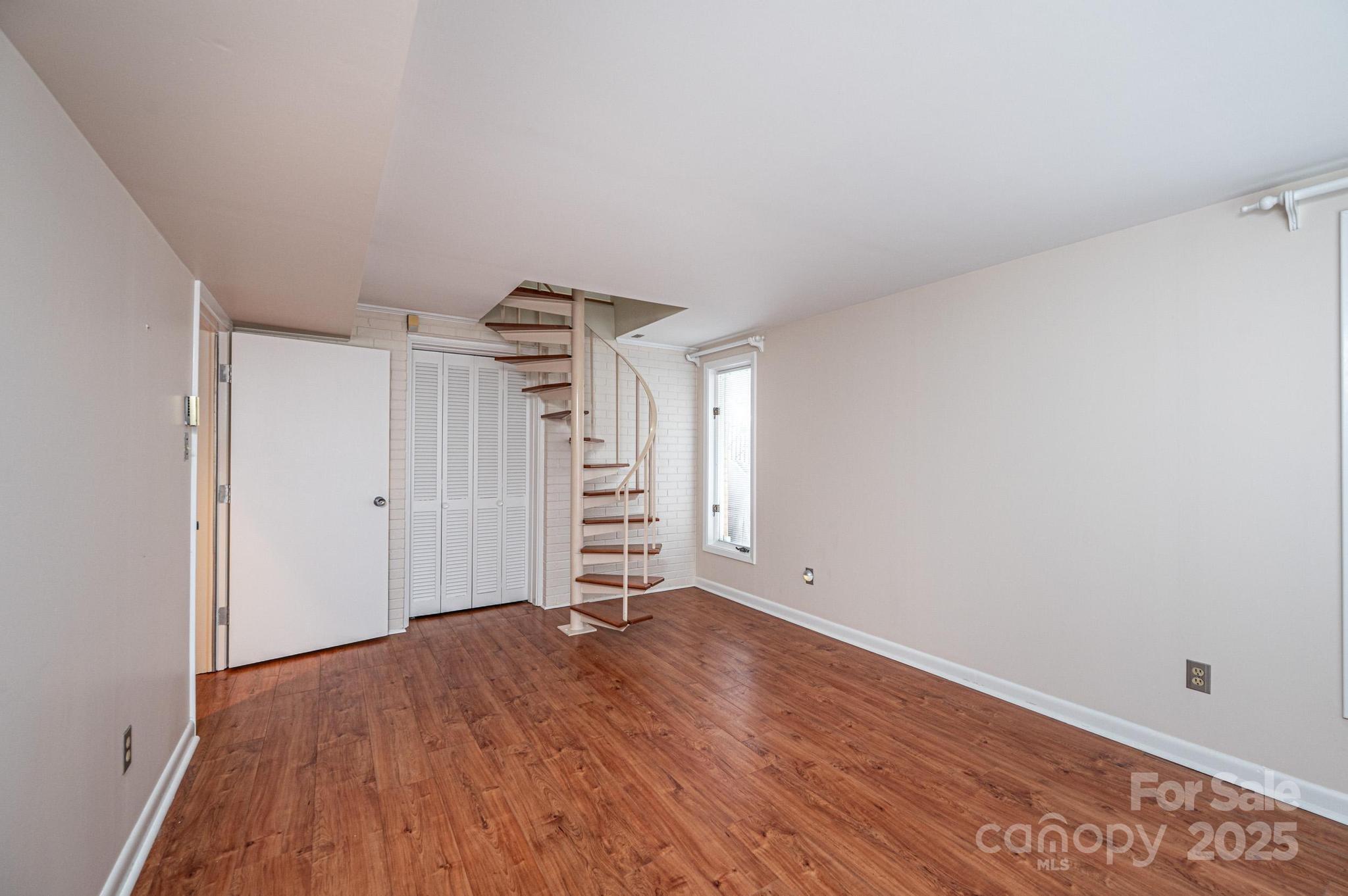 141 36th Avenue Northwest Hickory, NC 28601 - Photo 38 of 46 wooden floor in an empty room