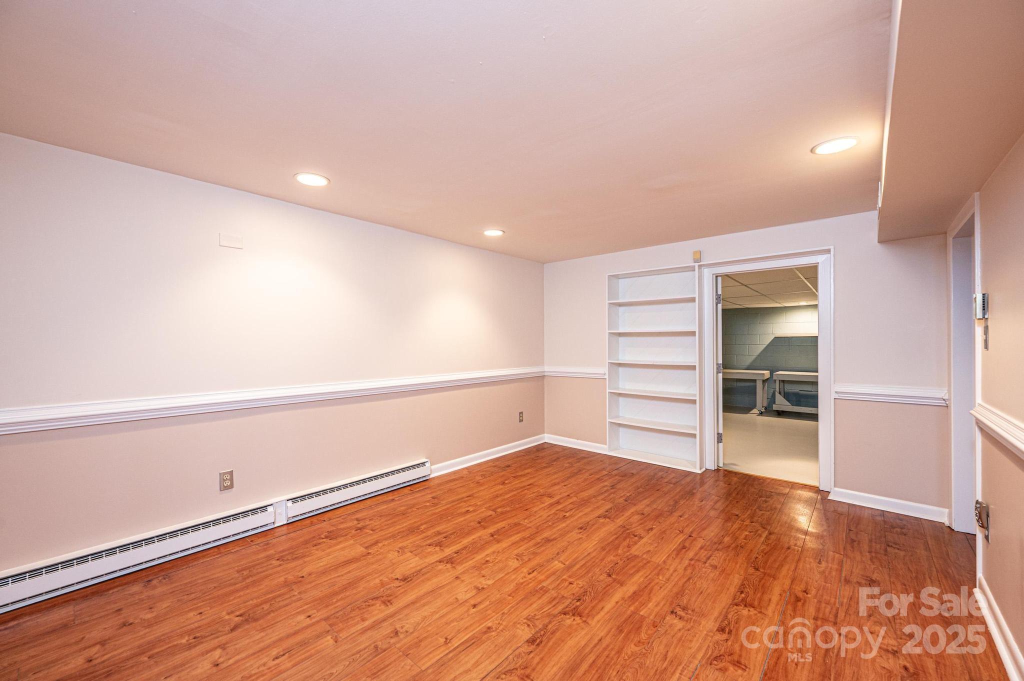 141 36th Avenue Northwest Hickory, NC 28601 - Photo 42 of 46 a view of an empty room with wooden floor and closet