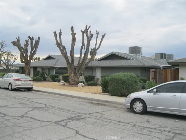 a car parked in front of a house