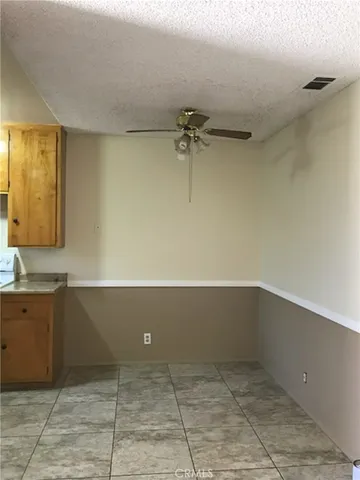 a view of a kitchen with a cabinets