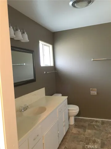 a bathroom with a sink and a toilet