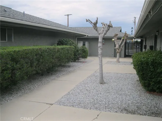 a view of a house with a street