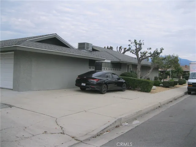 a car parked in front of a house