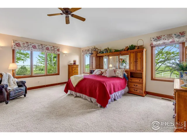 a bed room with a bed and a couch