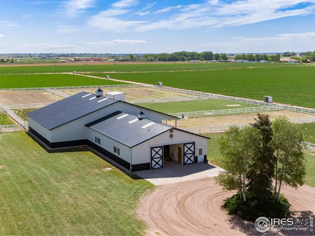 an aerial view of a house with a garden