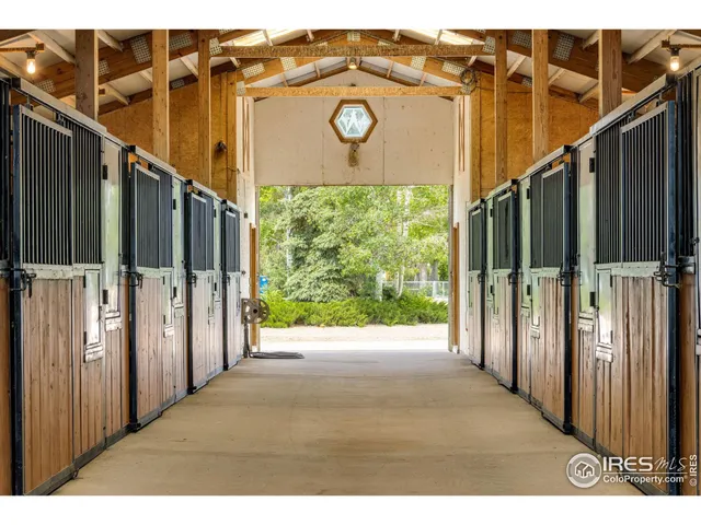 a view of a front door and wooden floor