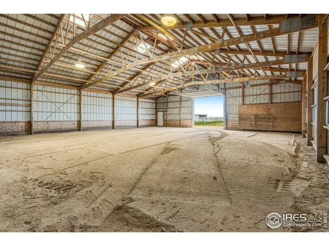 a view of a room with a wooden fence