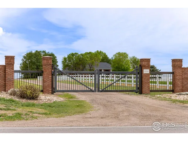 a view of a wrought iron fences in front of house
