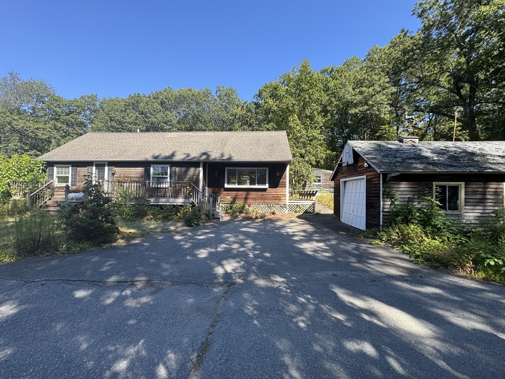28 Lindbergh Street Clinton, MA 01510 - Photo 1 of 27 a view of a house with a yard and tree s
