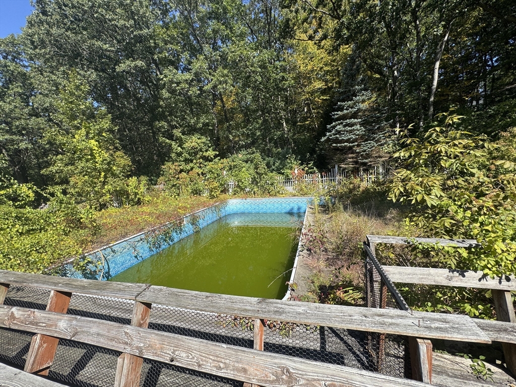28 Lindbergh Street Clinton, MA 01510 - Photo 14 of 27 a view of a yard with chairs