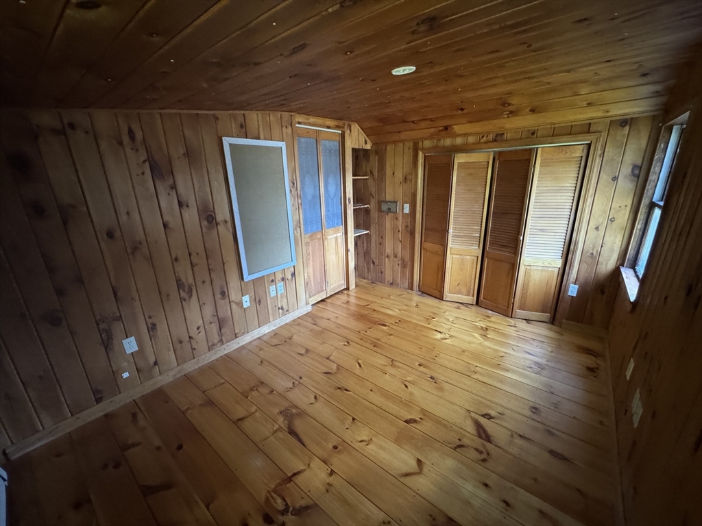 28 Lindbergh Street Clinton, MA 01510 - Photo 22 of 27 a view of hallway with wooden floor