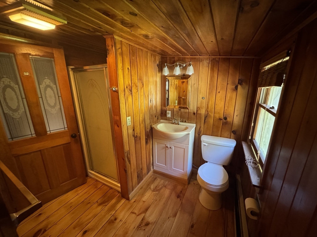 28 Lindbergh Street Clinton, MA 01510 - Photo 24 of 27 a bathroom with a sink toilet and shower