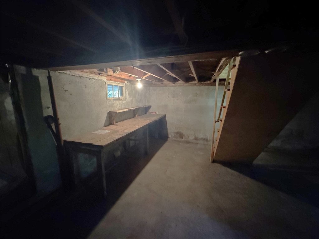 28 Lindbergh Street Clinton, MA 01510 - Photo 25 of 27 a hallway with stairs