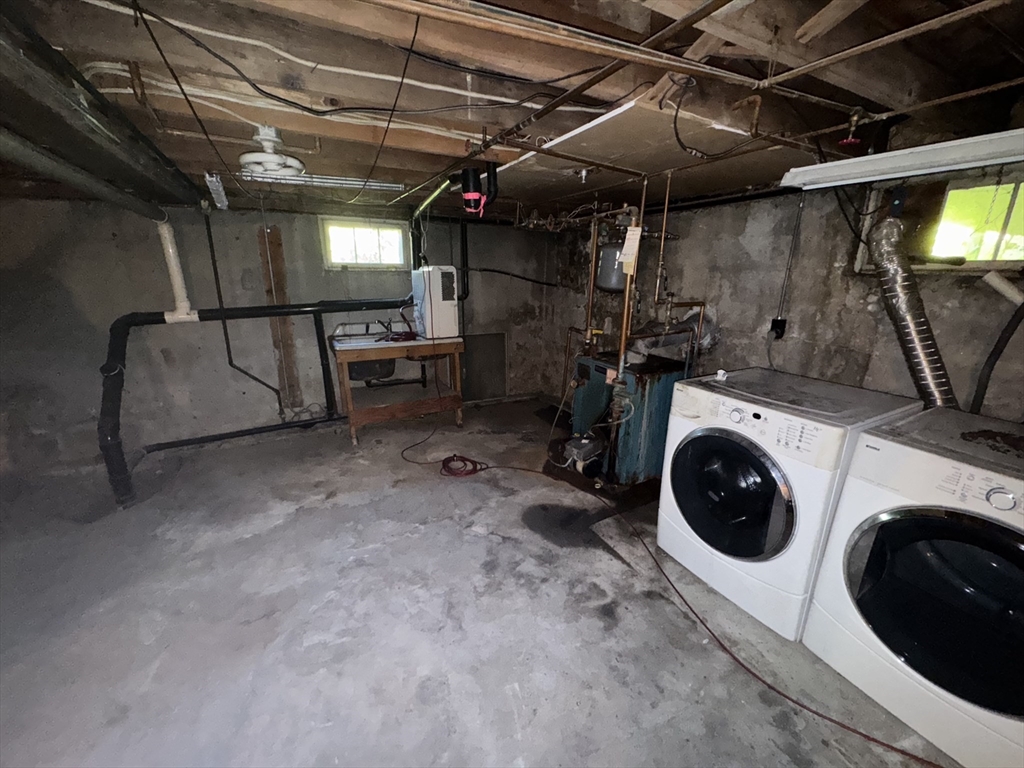 28 Lindbergh Street Clinton, MA 01510 - Photo 27 of 27 a utility room with dryer and washer