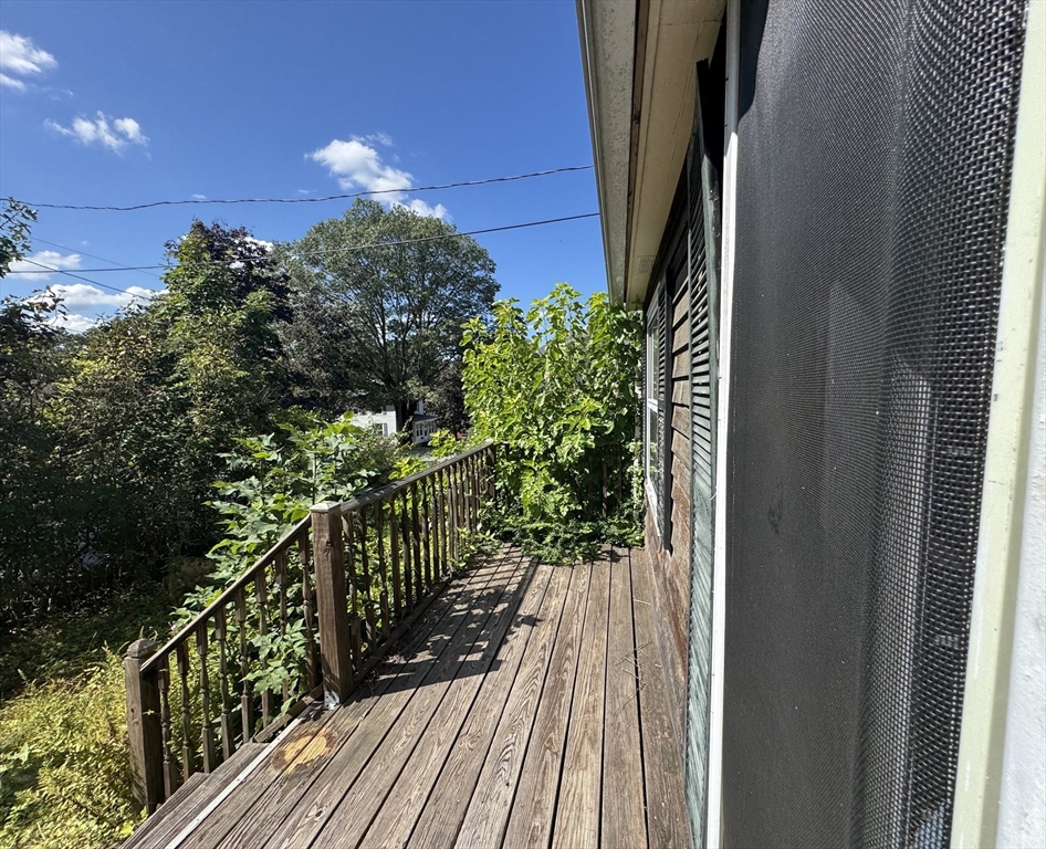 28 Lindbergh Street Clinton, MA 01510 - Photo 8 of 27 a view of balcony and wooden floor