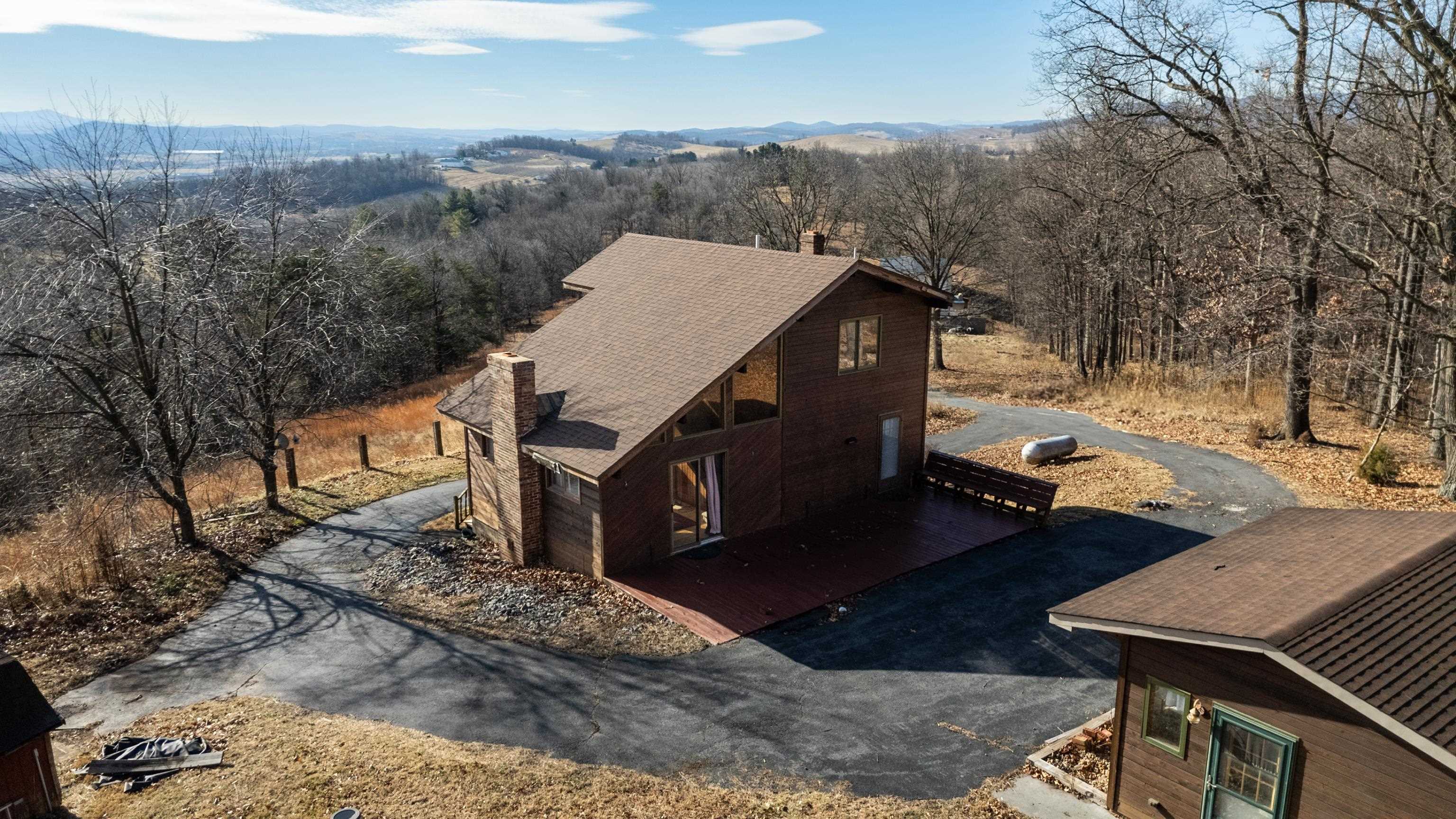 7386 Apple Ridge Drive Timberville, VA 22853 - Photo 1 of 62 a view of a terrace with a yard
