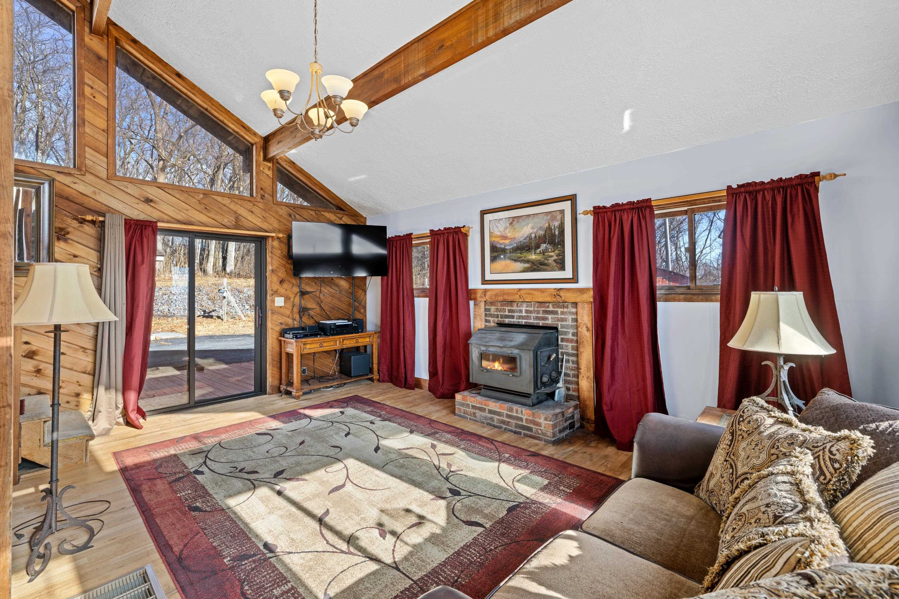 7386 Apple Ridge Drive Timberville, VA 22853 - Photo 13 of 62 a bed room with furniture and a fireplace