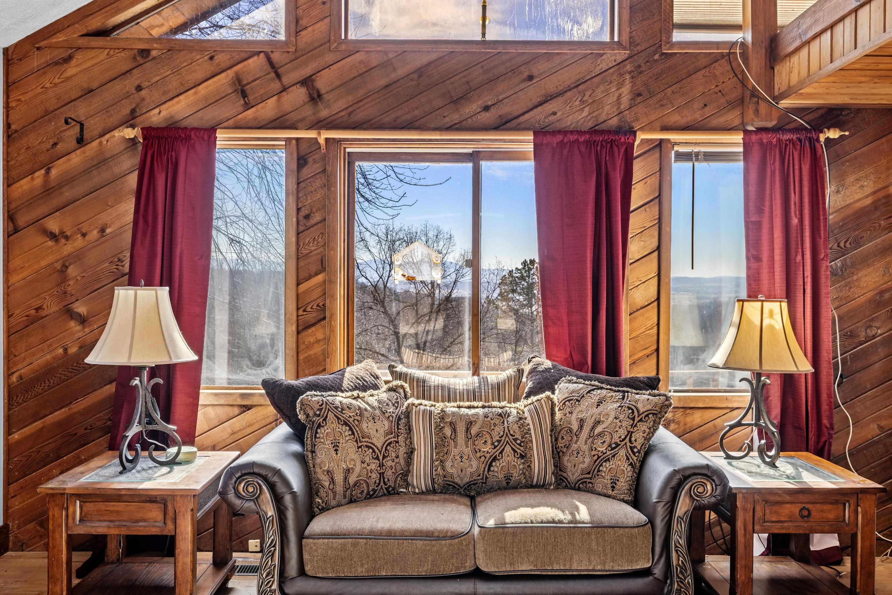 7386 Apple Ridge Drive Timberville, VA 22853 - Photo 17 of 62 a living room with furniture and a window