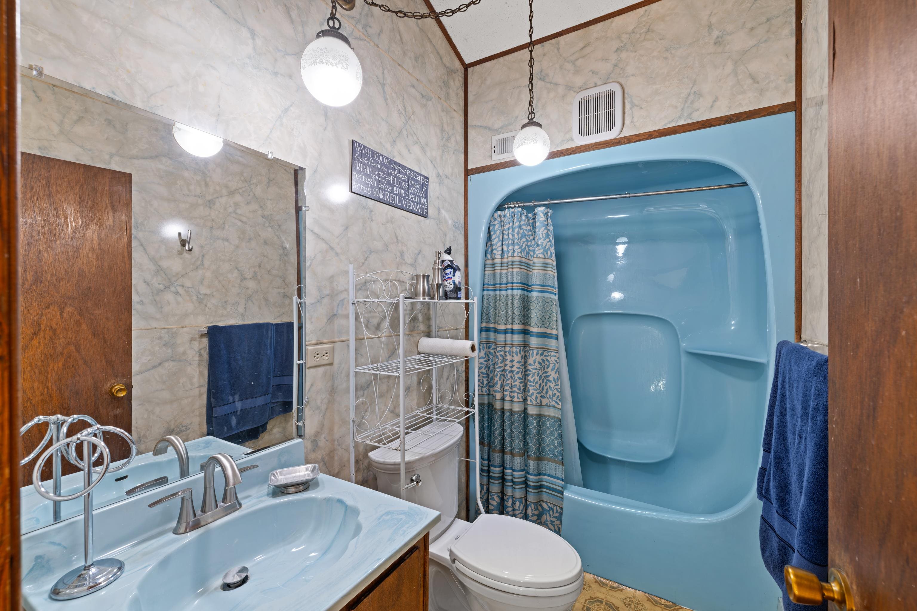 7386 Apple Ridge Drive Timberville, VA 22853 - Photo 29 of 62 a bathroom with a sink a toilet and shower