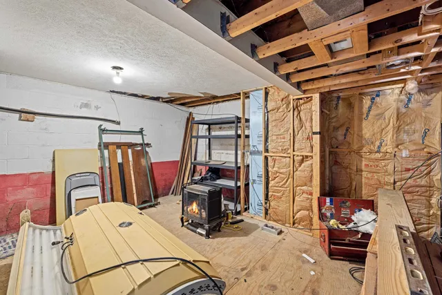 a stove top oven sitting inside of a kitchen