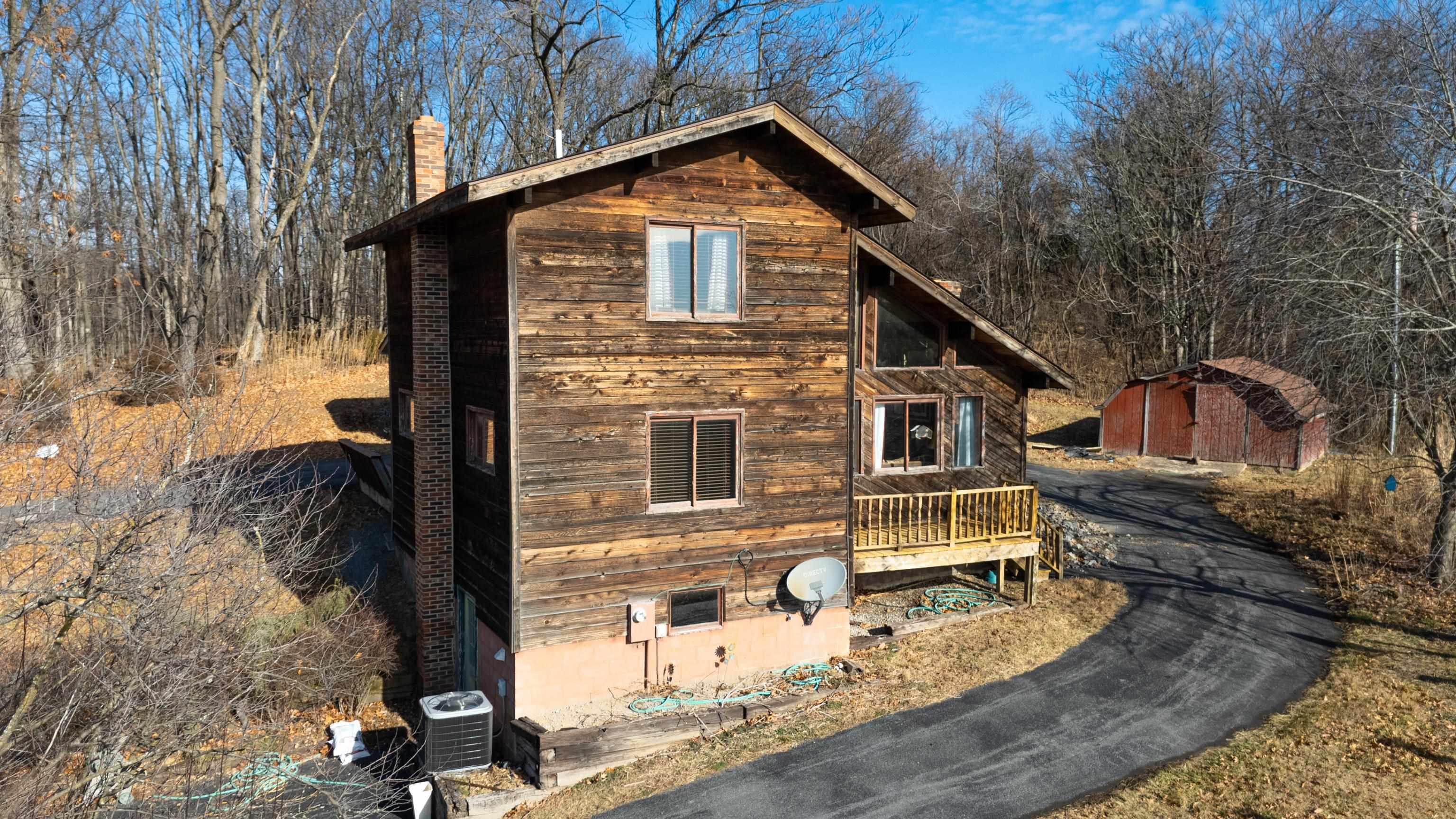 7386 Apple Ridge Drive Timberville, VA 22853 - Photo 45 of 62 a front view of a house with a yard