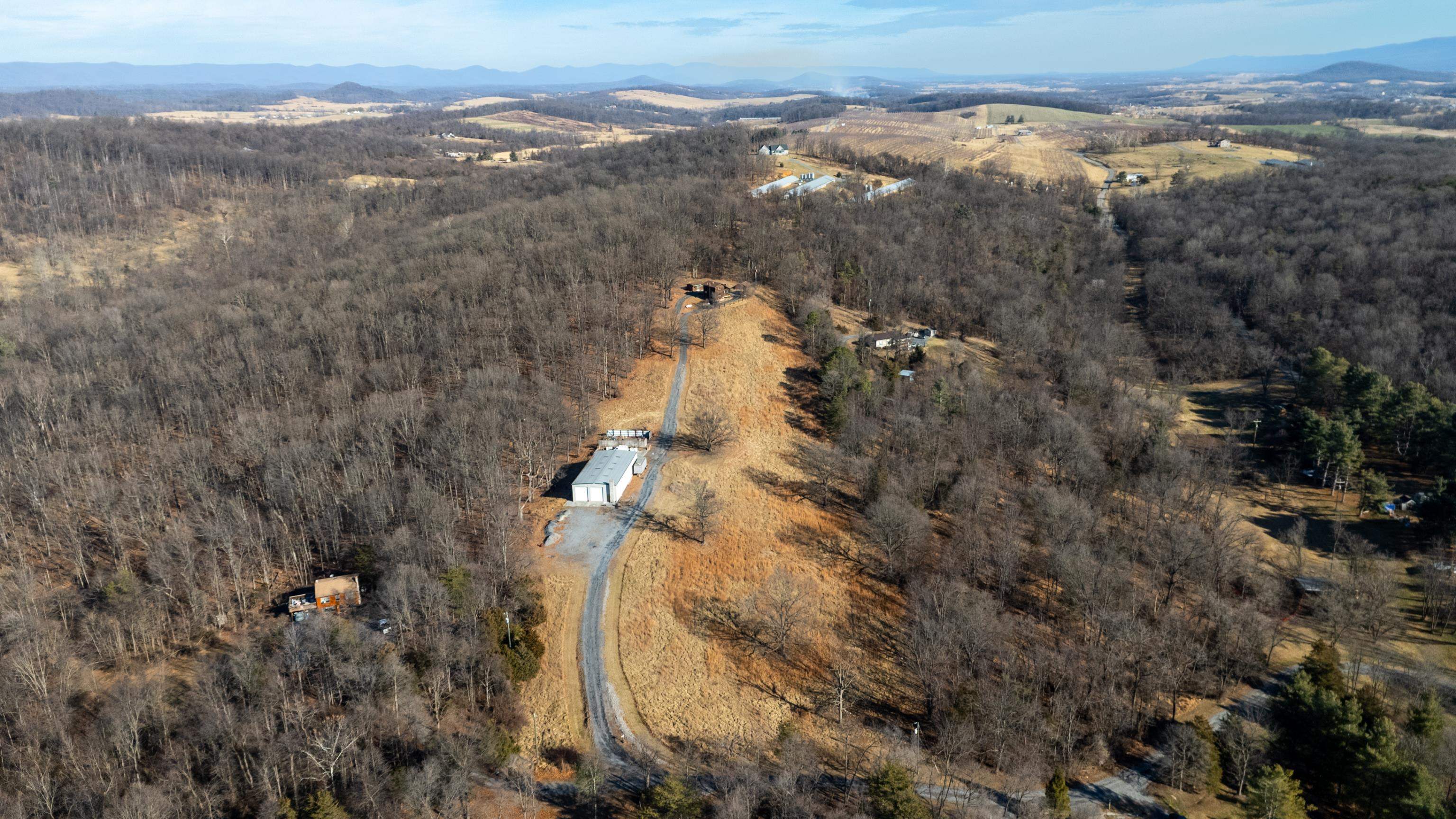 7386 Apple Ridge Drive Timberville, VA 22853 - Photo 59 of 62 an aerial view of house with yard and mountain view in back