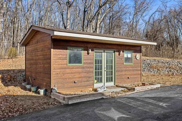 a front view of a house with a garage