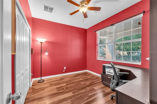 a view of a house with a yard and garage