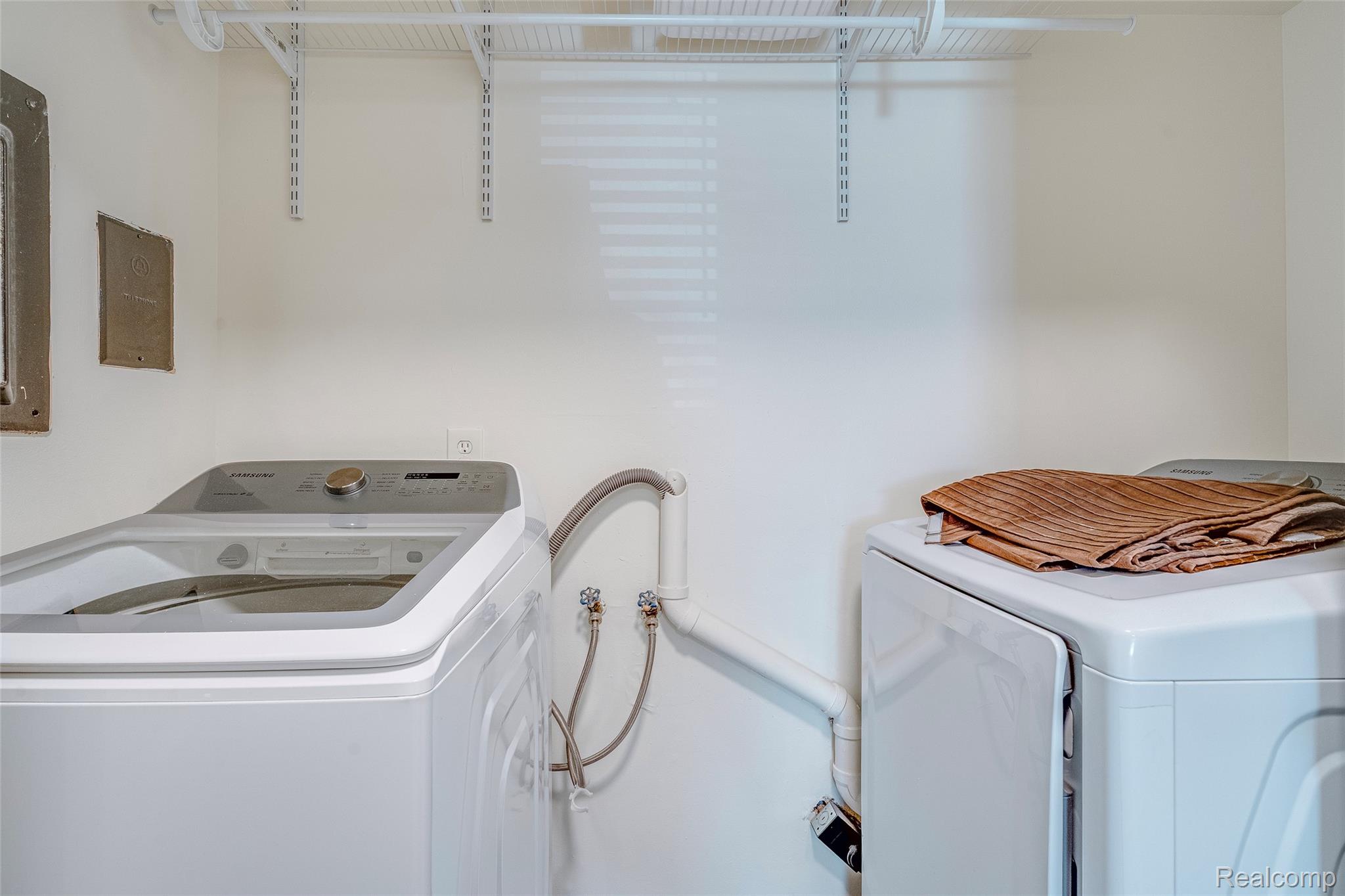 29860 West 12 Mile Road, Unit 604 Farmington, MI 48334 - Photo 22 of 26 Laundry room featuring washing machine and dryer